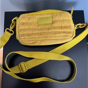 Beautiful Dagne Dover Mara velvet sling puff in Ochre.